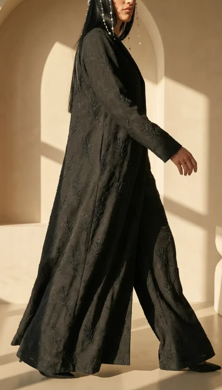 Flowing silhouette of black embroidered luxury kimono abaya in Dubai